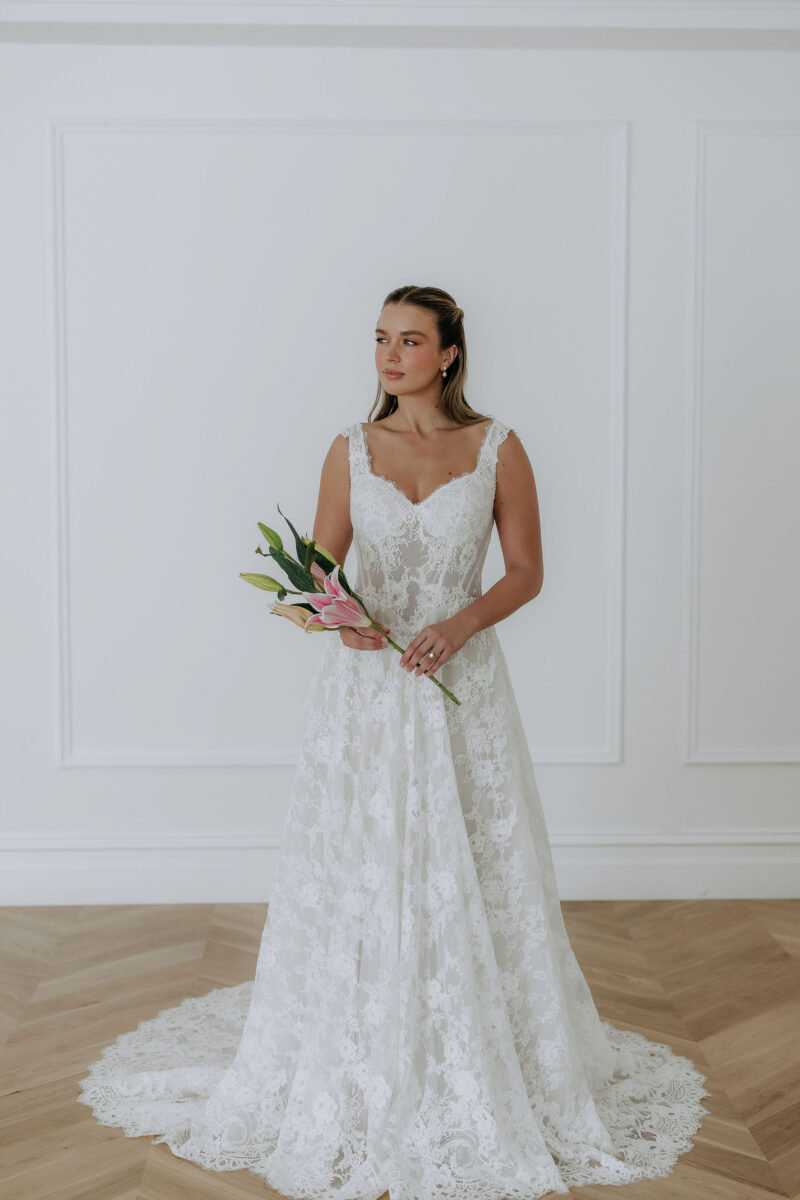 willa lace dress The Willa Dress, reimagined. Our lace program continues in a rich navy palette, striking a gorgeous balance between elegance and spice. Featuring puff sleeves, a finely smocked waist, and a tiered skirt,